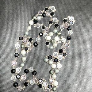 Premiere Opulence with black and clear beads, and faux white and gray pearls